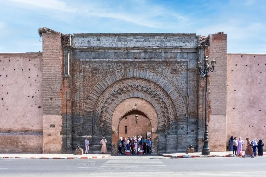 Morocco travel packages local guide explaining medina history tourists