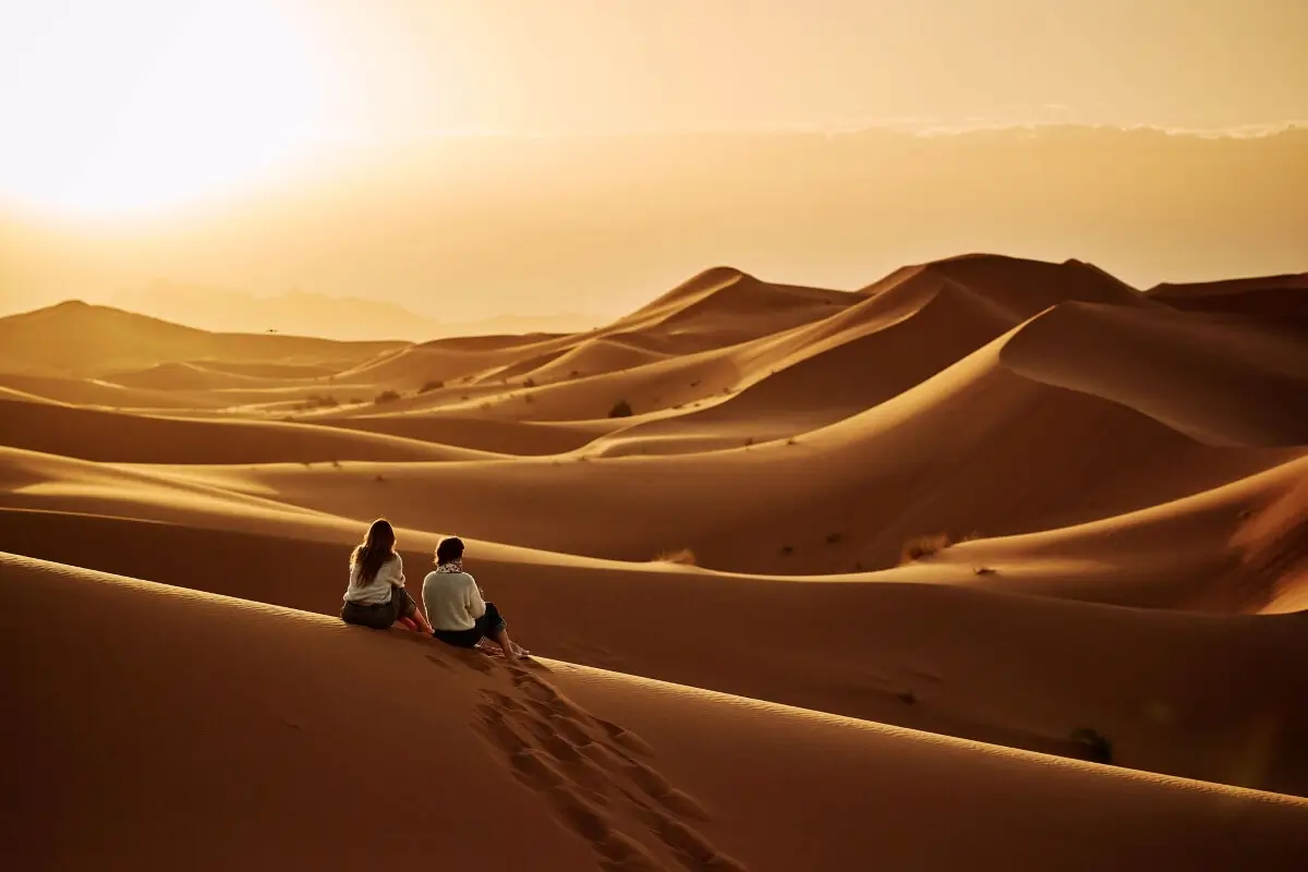 Sweeping golden dunes of Merzouga desert at sunrise in Morocco